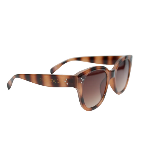 nicky tortoiseshell brown front Angled side view of tortoiseshell brown sunglasses with soft square frames, brown gradient lenses, and branded temple detailing on a light background.