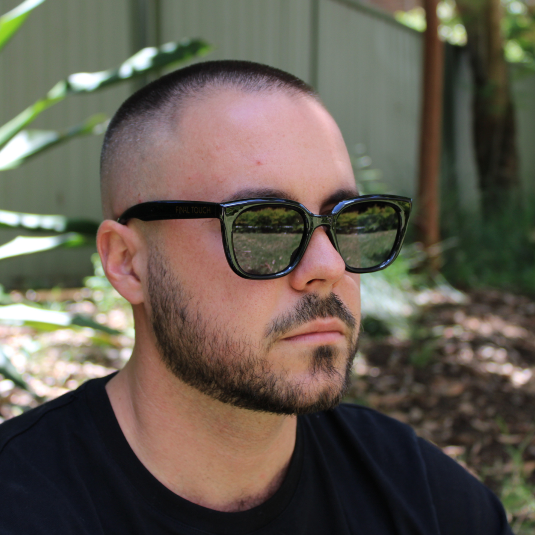 man wearing abby black sunglasses
