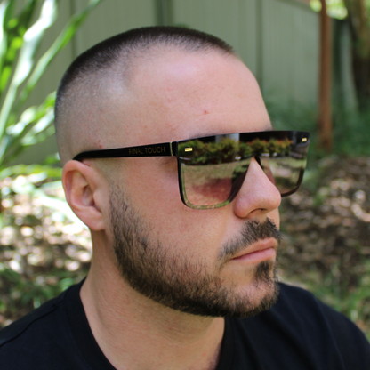 man wearing archie black rose sunglasses