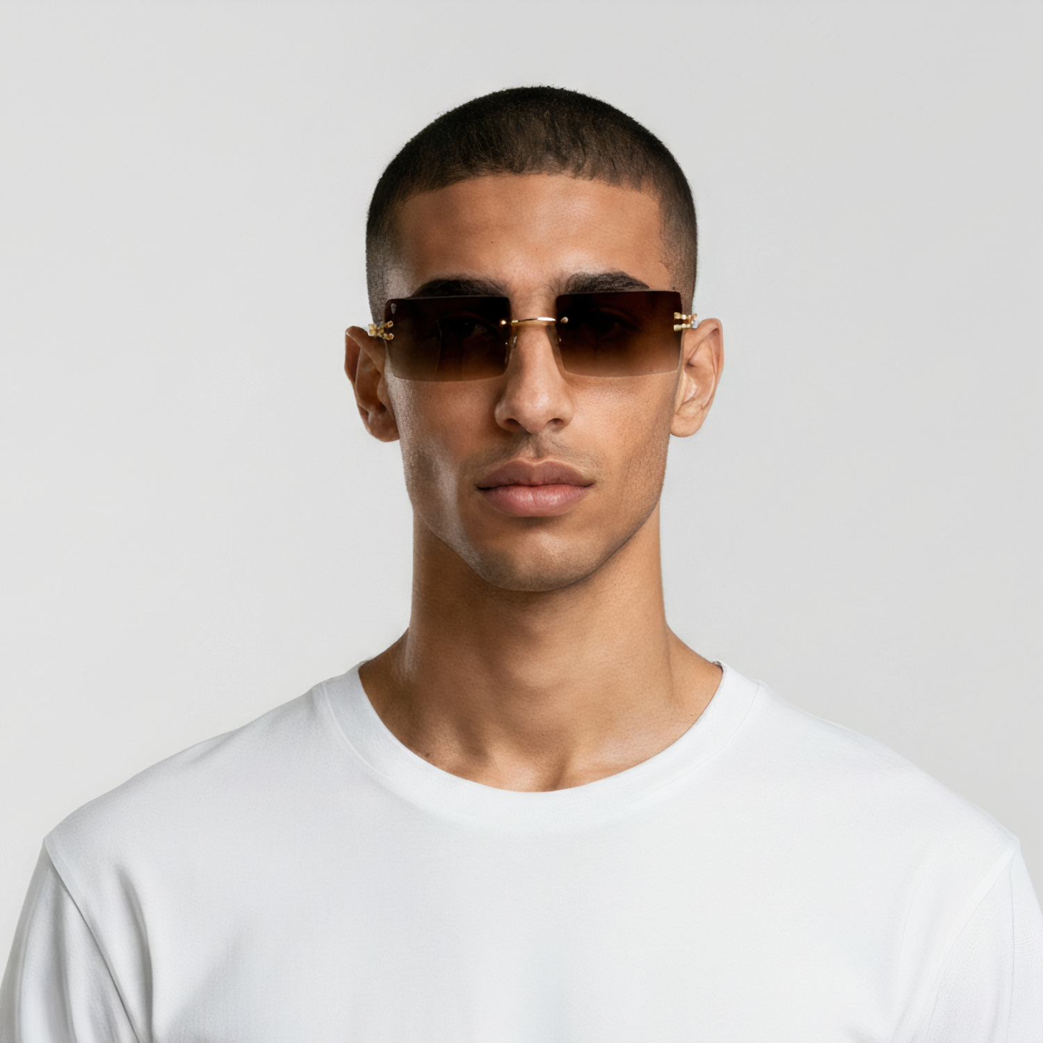 Male model styled in sunglasses with gold frame and brown lenses UV400 – Brittany by Final Touch