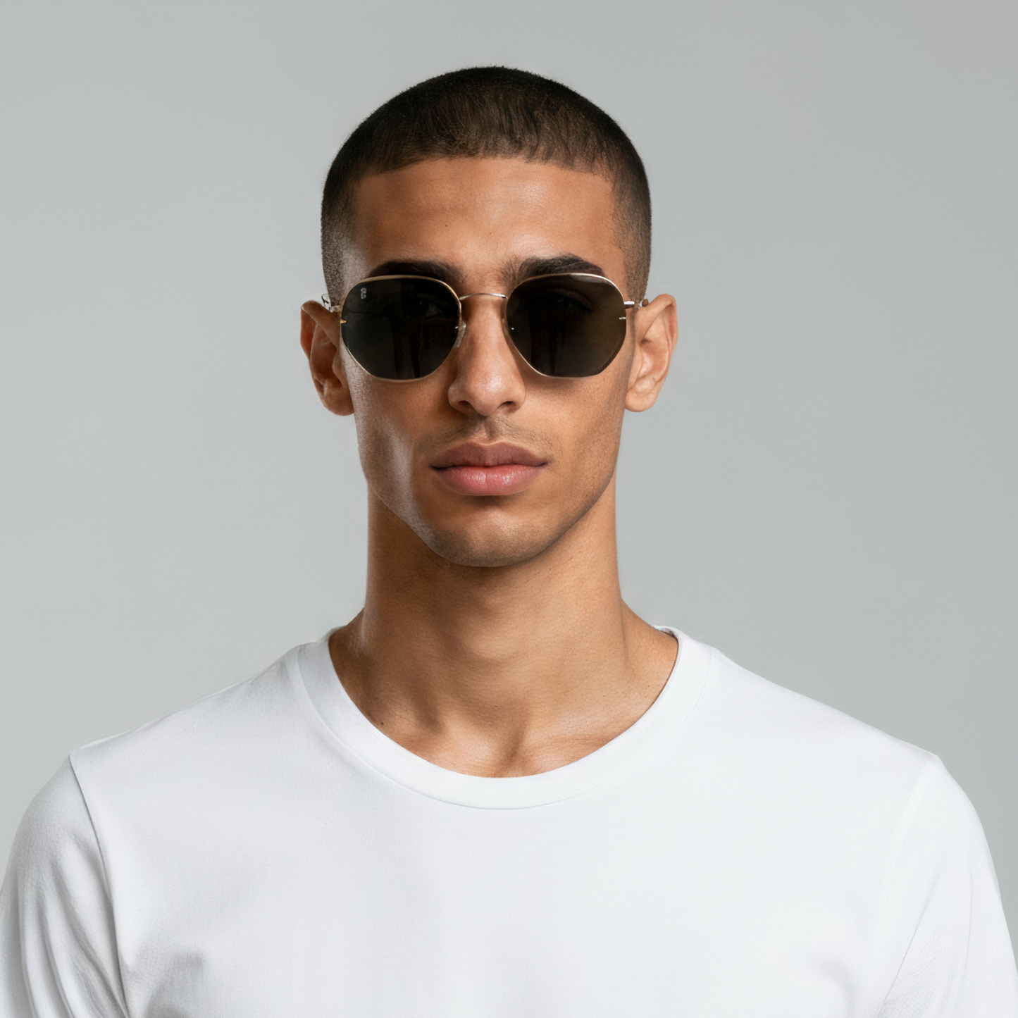 Male model styled in gold aviator sunglasses with black lenses UV400 – Brydan by Final Touch