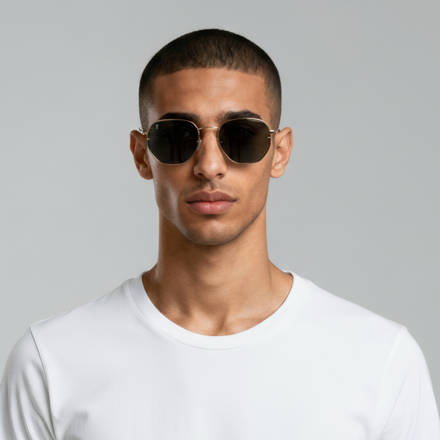 Male model styled in gold aviator sunglasses with black lenses UV400 – Brydan by Final Touch