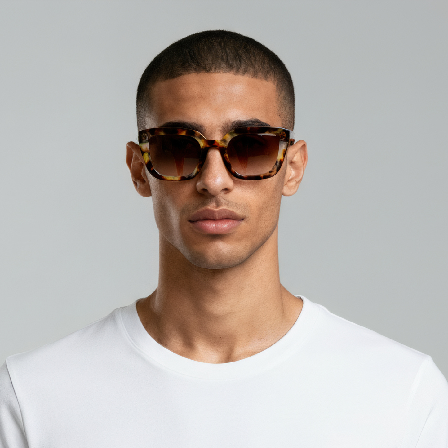Male model styled in amber tortoise cat eye sunglasses with brown lenses UV400 – Camila by Final Touch