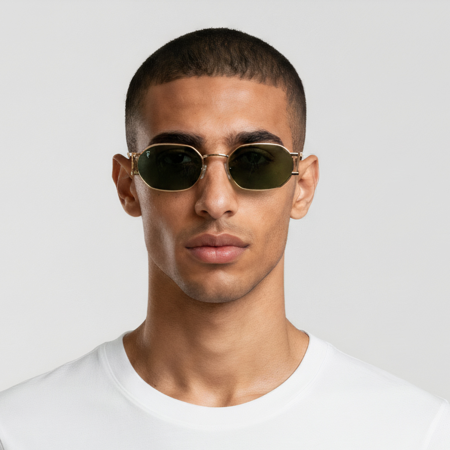 Male model styled in round gold frame sunglasses with green lenses UV400 – Charlotte by Final Touch