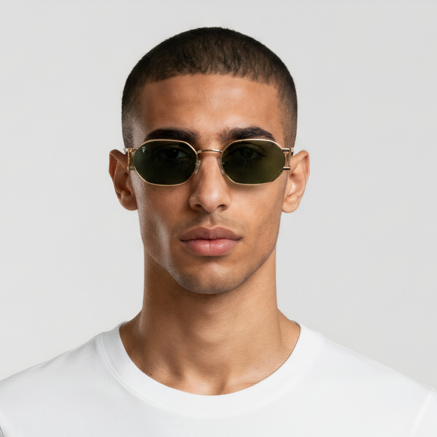 Male model styled in round gold frame sunglasses with green lenses UV400 – Charlotte by Final Touch