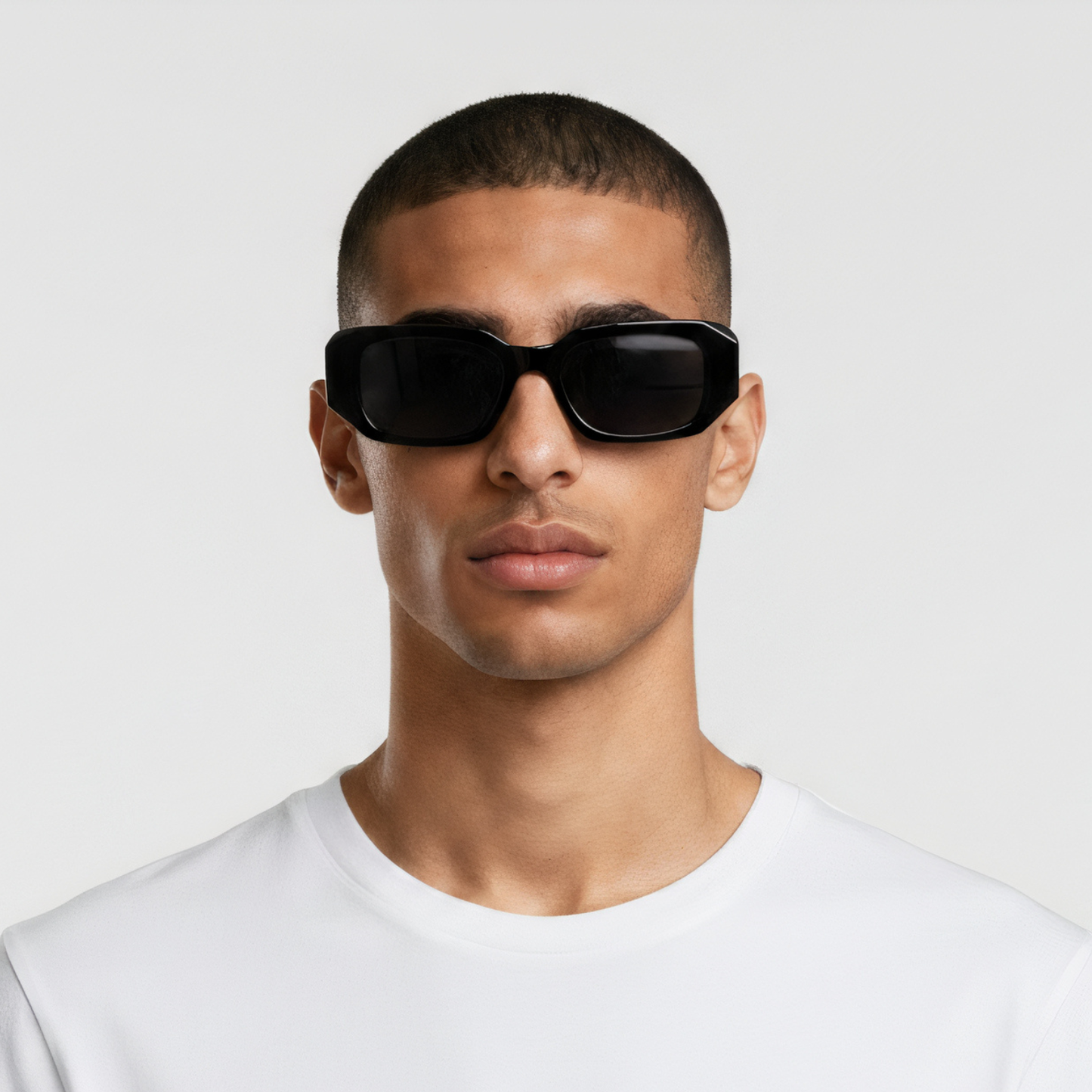 Male model styled in rectangular black sunglasses with smoke lenses UV400 – Emily by Final Touch