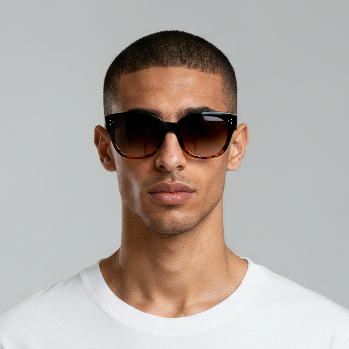 Male model styled in midnight amber cat eye sunglasses with amber lenses UV400 – Nicky by Final Touch