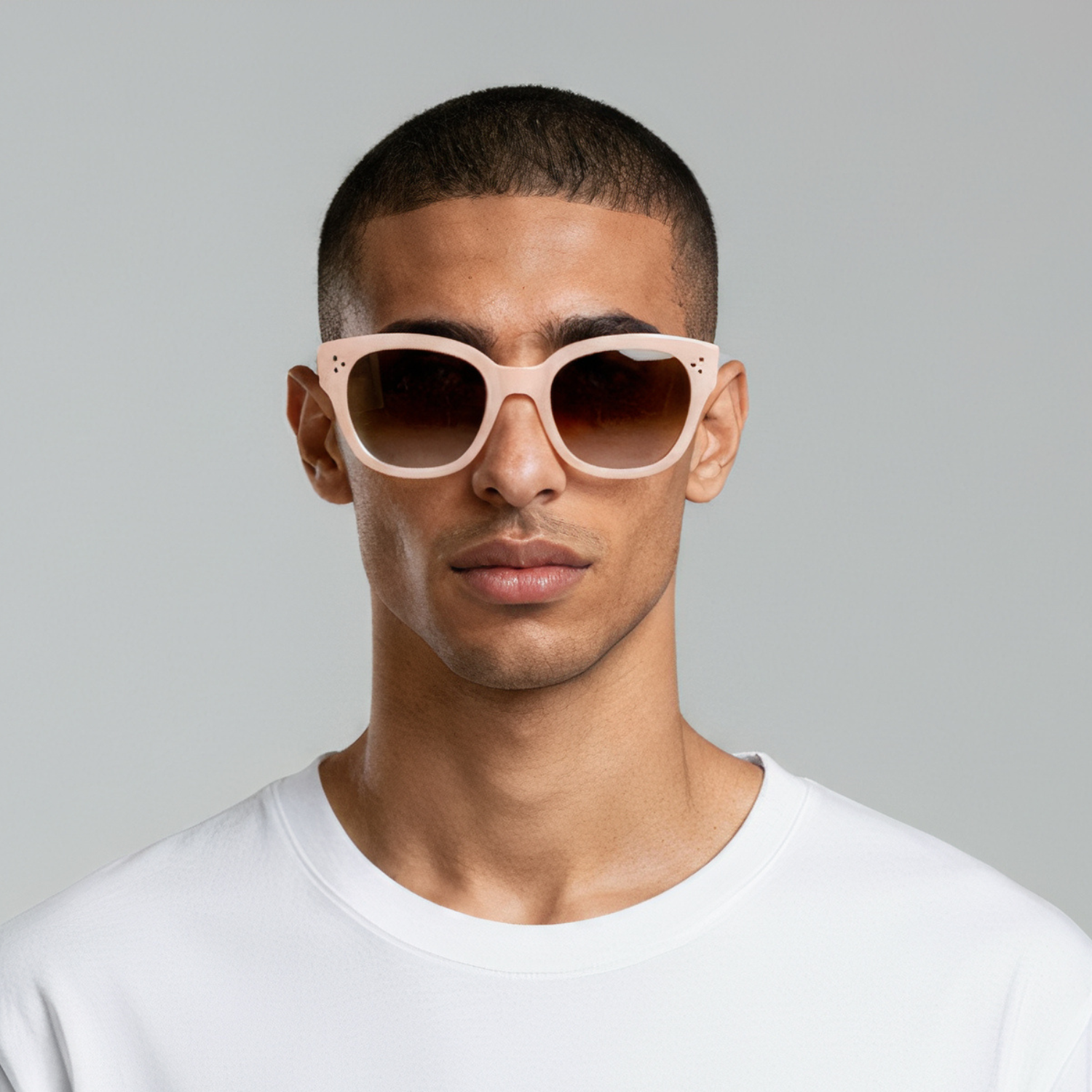 Male model styled in nude cat eye sunglasses with smoke lenses UV400 – Nicky by Final Touch