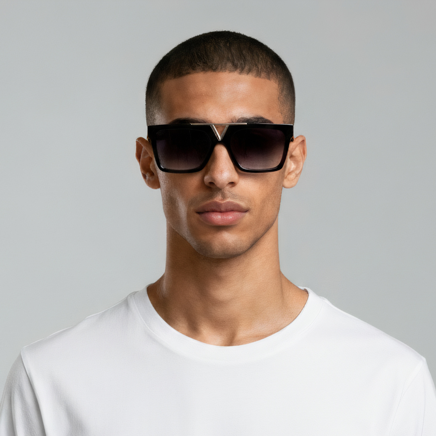 Male model styled in rectangular black and gold sunglasses with smoke lenses UV400 – Wade by Final Touch