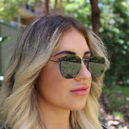 woman wearing brydan jet black sunglasses