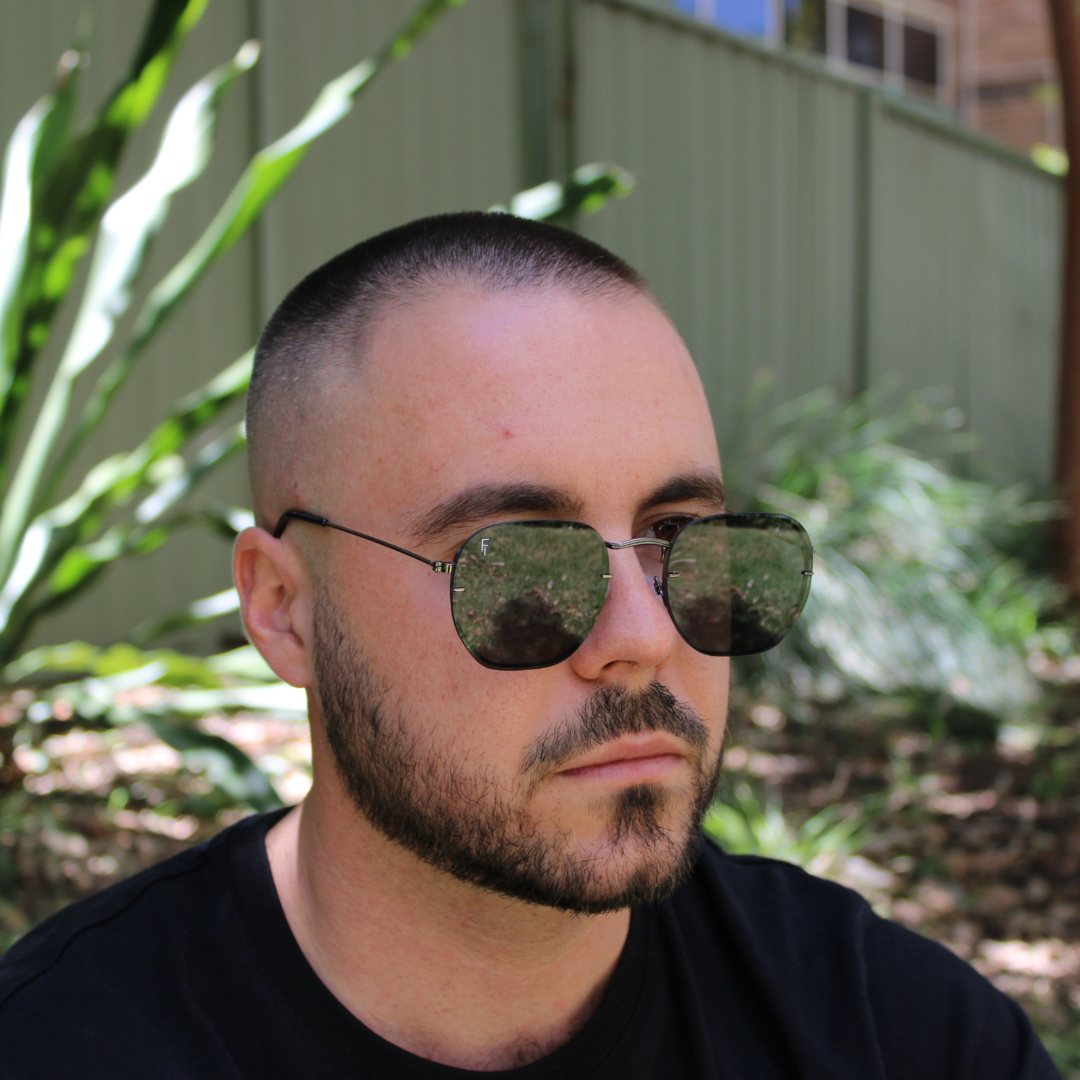 man wearing brydan jet black sunglasses