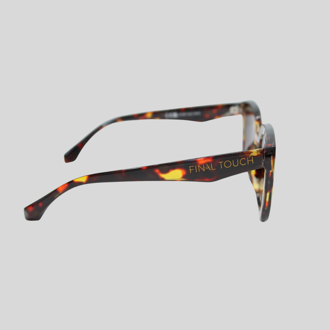 Camila Amber Tortoise side sunglasses showing tortoiseshell acetate frame and Final Touch logo on temple.”