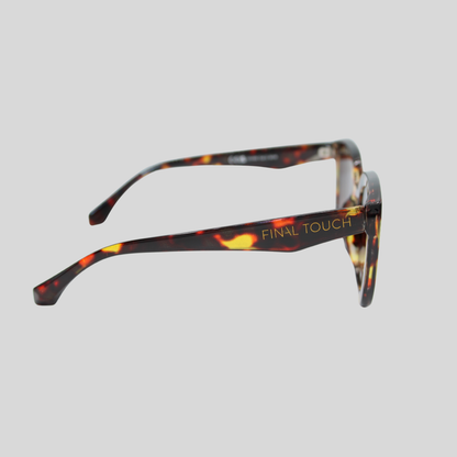 Camila Amber Tortoise side sunglasses showing tortoiseshell acetate frame and Final Touch logo on temple.”