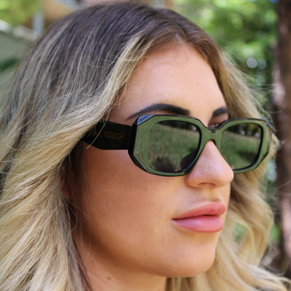 woman wearing emily black sunglasses