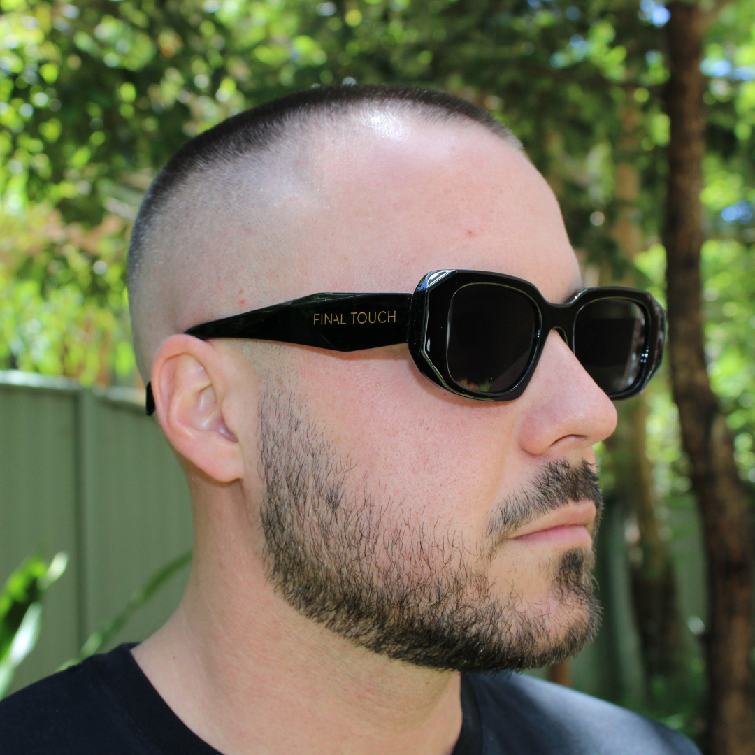 man wearing emily black sunglasses
