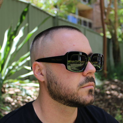 man wearing gabby black sunglasses