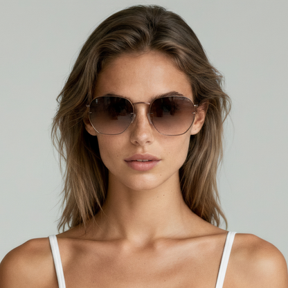 Female model wearing aviator sunglasses with brown frame and brown lenses UV400 – Brydan by Final Touch