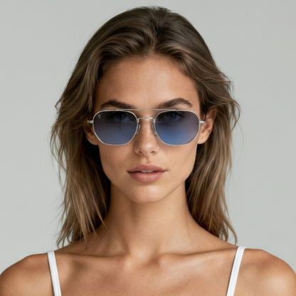 Female model wearing aviator sunglasses with silver frame and blue lenses UV400 – Lennon by Final Touch