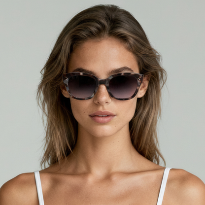 Female model wearing cat eye sunglasses with dark tortoiseshell frame and brown lenses UV400 – Nicky by Final Touch