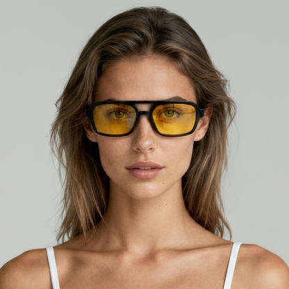 Female model wearing rectangular sunglasses with black frame and yellow lenses UV400 – Tony by Final Touch