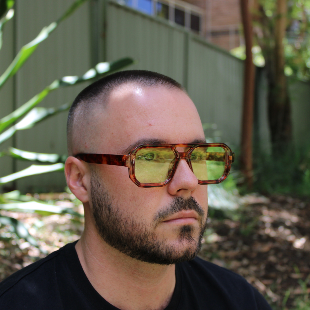 man wearing jensen tortoiseshell green sunglasses 