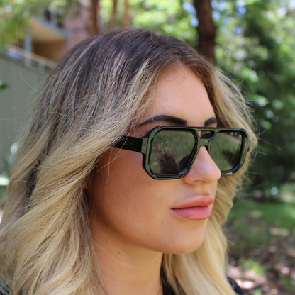 Woman wearing jensen black sunglasses