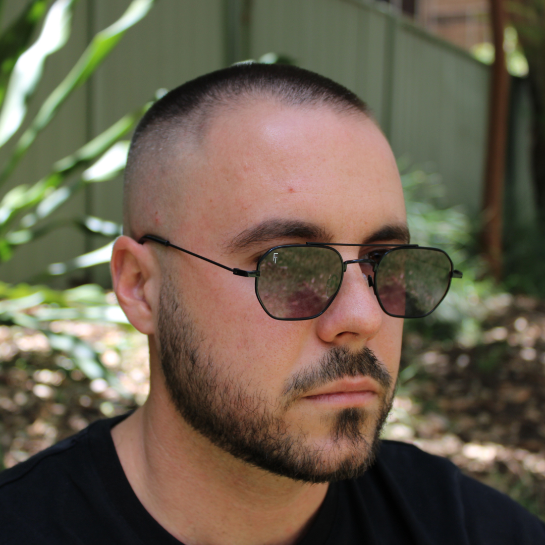 man wearing matte black smoke sunglasses 