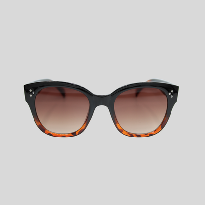 Nicky Midnight Amber unisex sunglasses with black frame and amber lenses