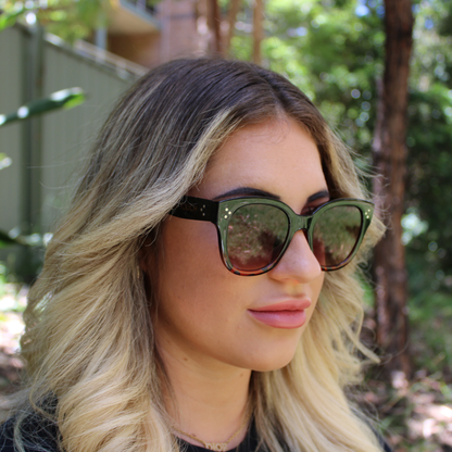 woman wearing nicky midnight amber sunglasses