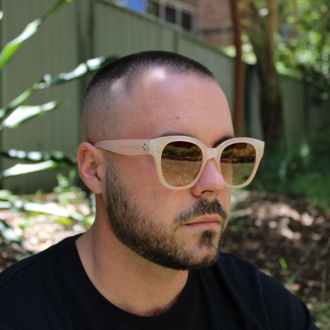 man wearing nicky nude sunglasses