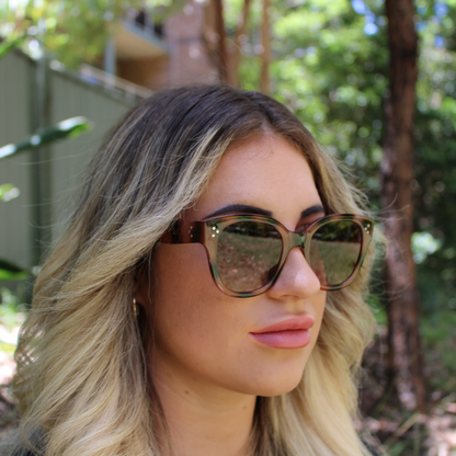 woman wearing nicky tortoiseshell sunglasses