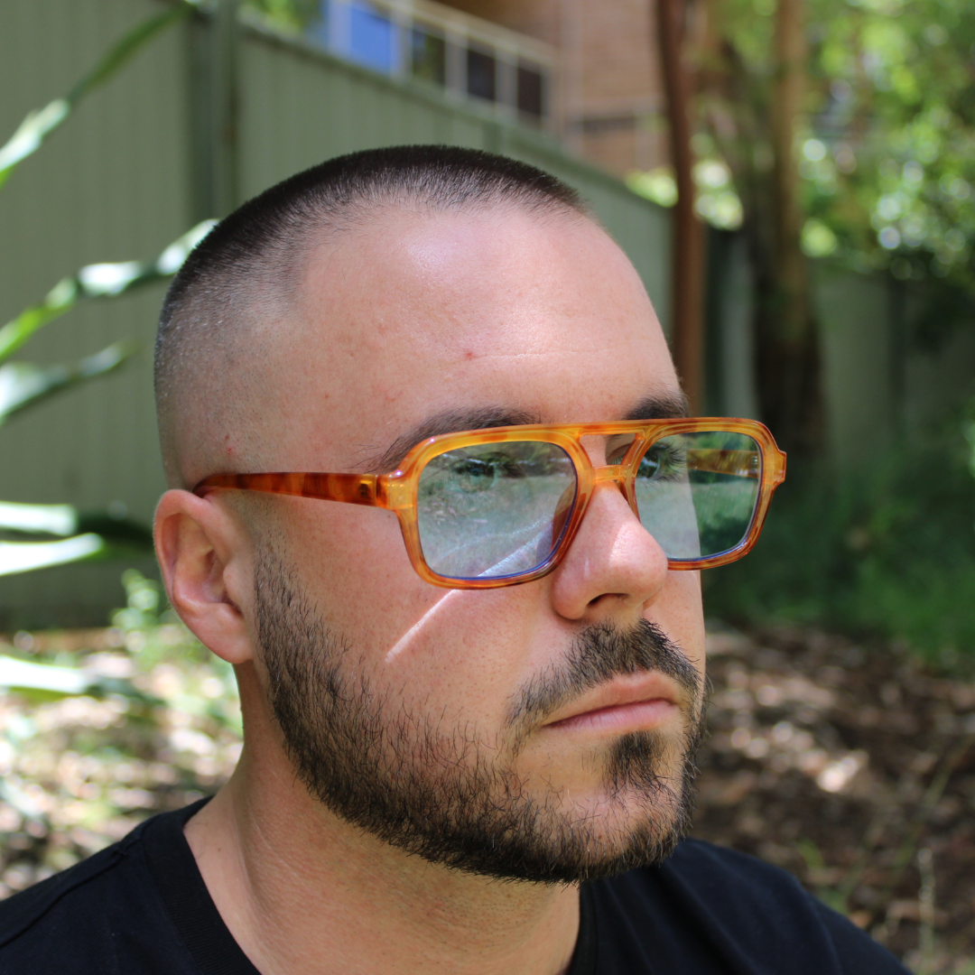 man wearing tony honey tortoise sunglasses