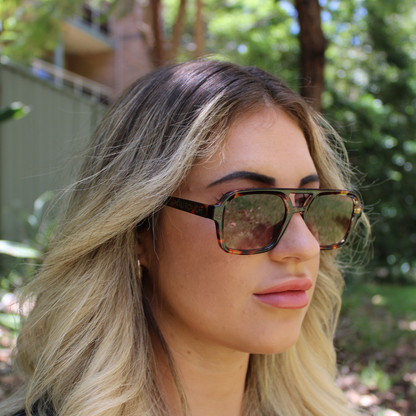woman wearing tony vintage tortoise sunglasses