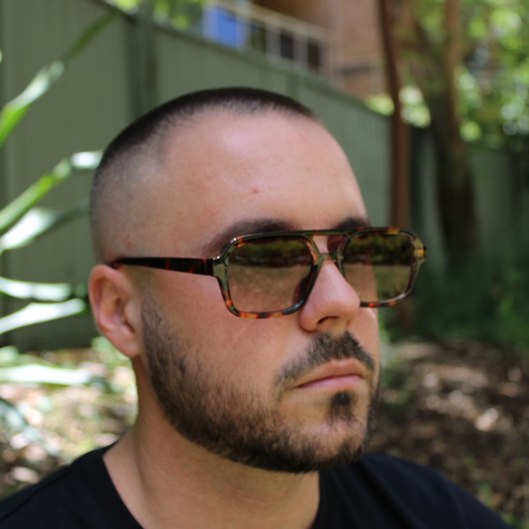 man wearing tony vintage tortoise sunglasses