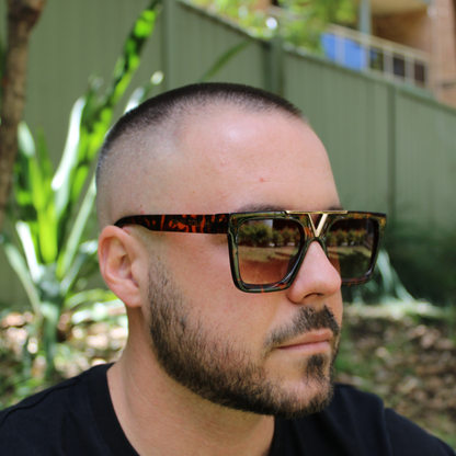 man wearing wade classis tortoise sunglasses